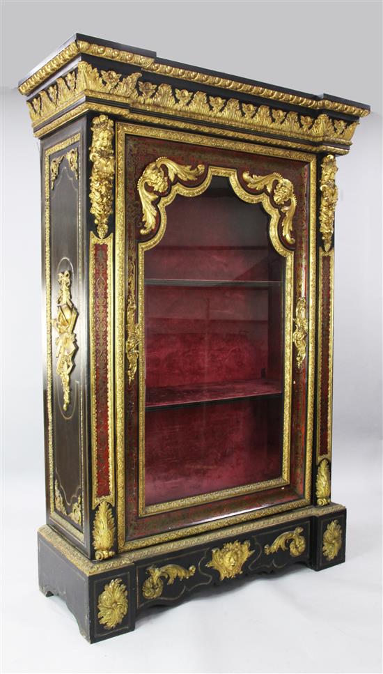 A 19th century French ormolu mounted red boullework vitrine, W.4ft 8in. D.1ft 10.5in. H.6ft 10in.